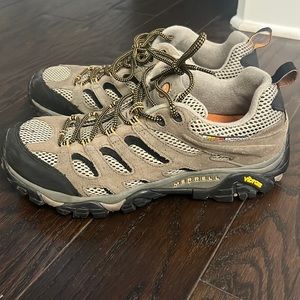 Beige and black Merell hiking shoes